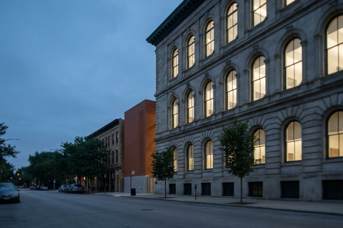The facade of a Chicago civic courthouse building at blue hour